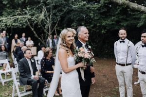 dad walking bride up the aisle at her luxury outdoor countryside wedding