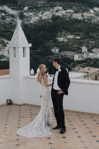 bride and groom on the rooftop of Villa Eva with the view of the Amalfi Coast